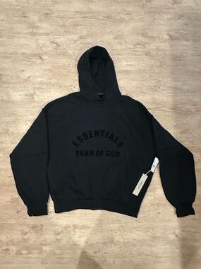 Fear of God Essentials Black Pullover Hoodie with Embossed Logo